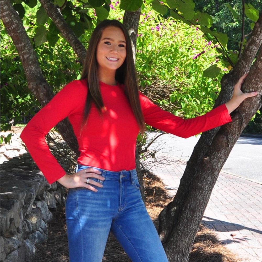 Cute bodysuit for layering or as an outfit with pants!
